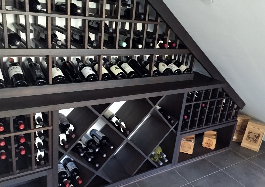 Residential Custom Wine Cellar Under the Stairs Designed by a Trusted Builder in Austin