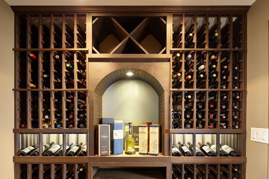 This Wine Cellar Lighting Illuminates the Archway Display in one of Our Projects in Austin