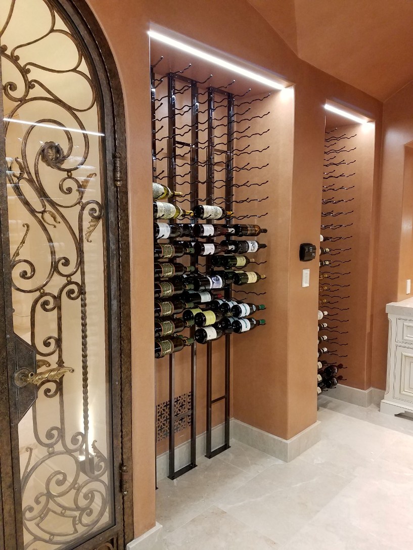 Elegant Residential Custom Wine Cellar with Metal Wine Racks Designed by Austin Experts