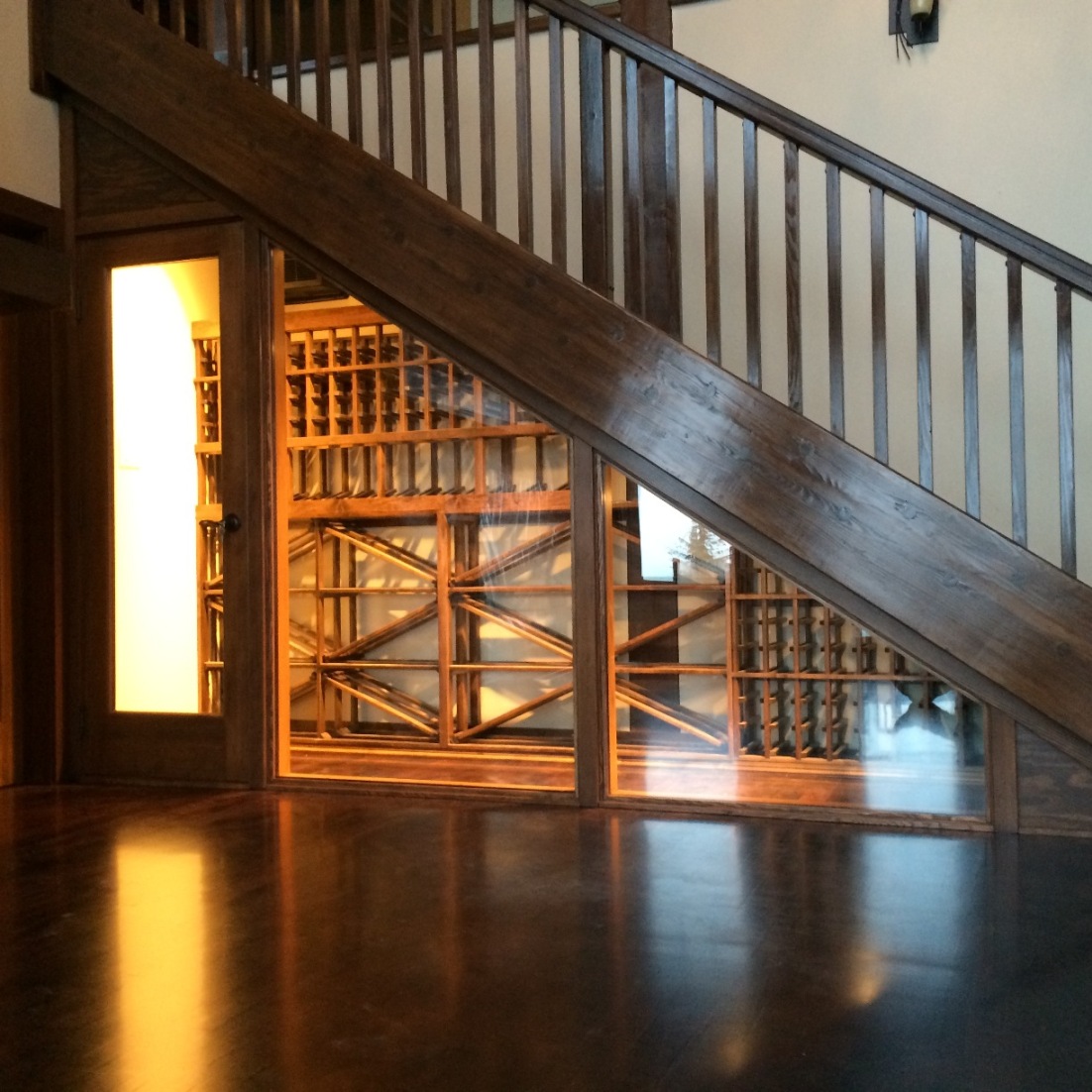 Classic Custom Wine Cellar Built Under the Stairs of an Austin Home