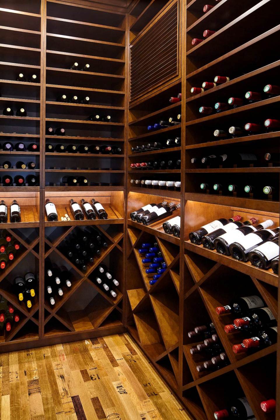 Classic Custom Wine Cellar Racks and Wine Barrel Flooring Installed by Austin Master Builders
