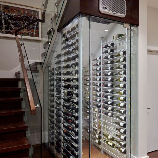 Custom Wine Cellar with Metal Custom Wine Racks Built Under the Stairs in Austin