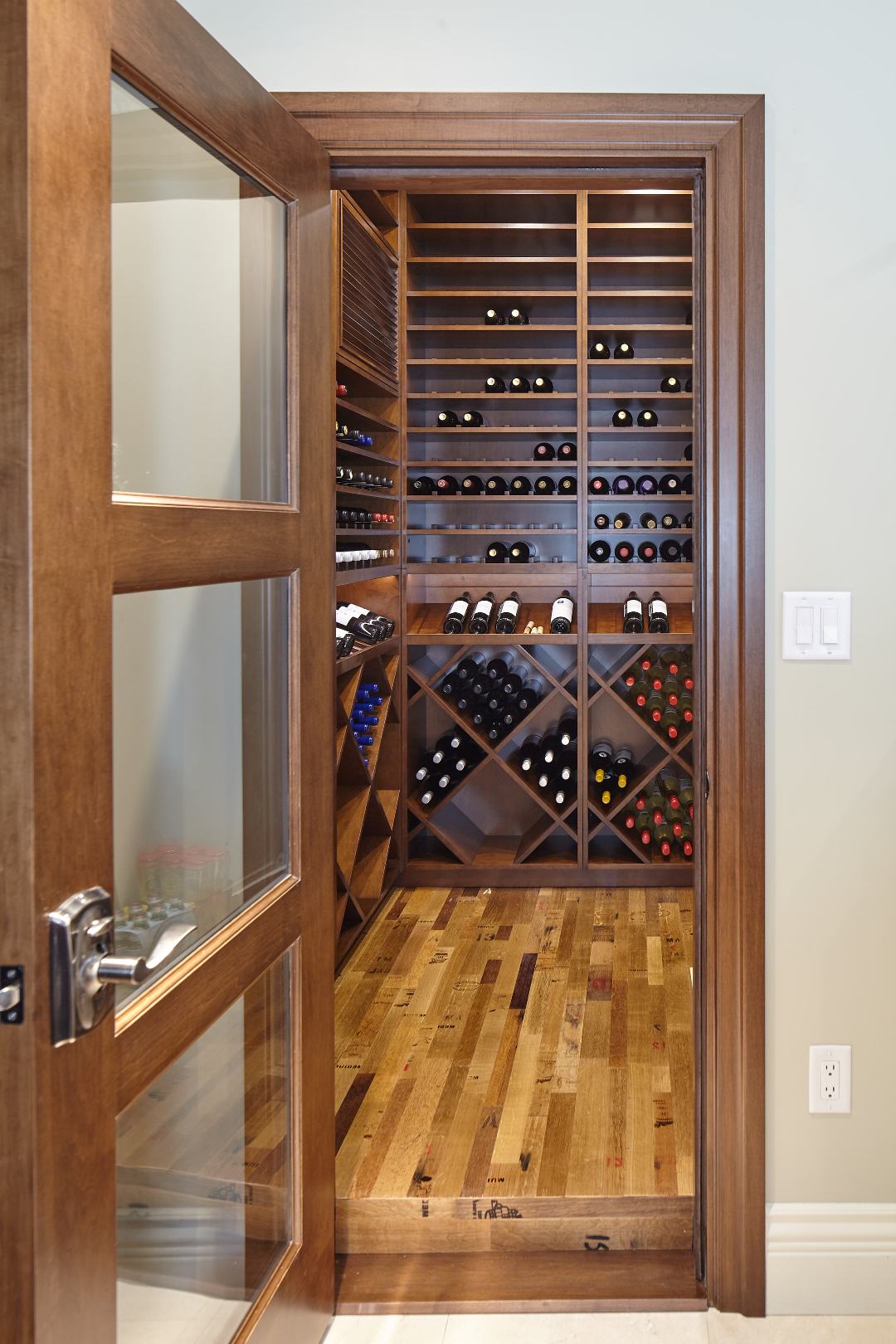 Traditional Residential Custom Wine Cellar in Austin Imstalled with a Glass Door