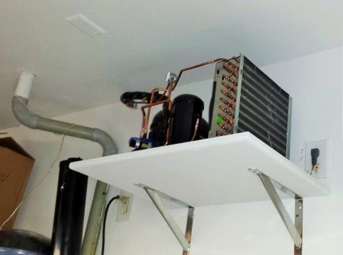 Wine Cellar Cooling System Condenser-Placed-in-the-Garage Austin wine cellar Project
