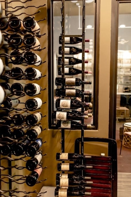 Metal Wine Racks were Perfect for this Modern Commercial Wine Cellar