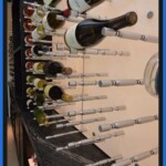 A black marble wine cellar tabletop is great for modern and luxurious wine displays.