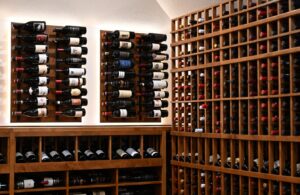 5 - LED Backlit Custom Wine Racks Highlight Collection in Austin Cellar Custom wine racks with LED backlighting in Tarrytown, Austin traditional wine cellar