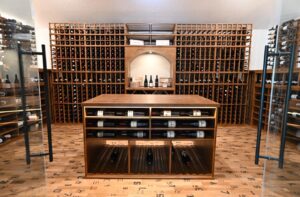 1 - Standout Wine Room in Tarrytown, Austin Highlighting Elegant Custom Wine Racks Double-deep custom wine racks in luxury wine cellar in Tarrytown, Austin, Texas.