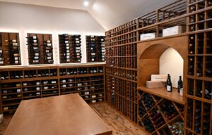 3 - Contemporary Wine Cellar Design with LED-Lit Custom Wine Racks Double-deep custom wine racks in luxury wine cellar in Tarrytown, Austin, Texas.
