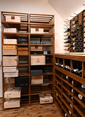 6 - Custom Wine Racks in a 4,000-Bottle Cellar and Case Storage Double-deep custom wine racks in 4000-bottle cellar in Austin, Texas.